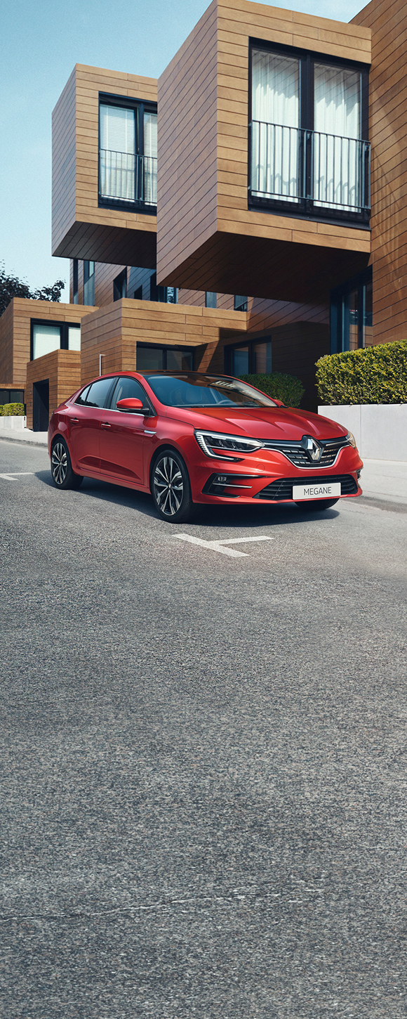 Renault Megane Sedan park front of a Building