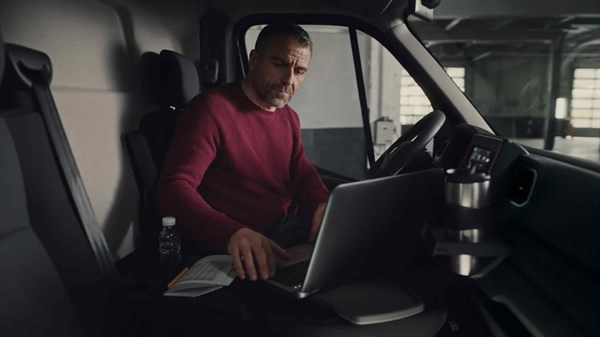 Renault Service - Company director working inside his car